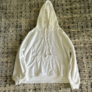 White sweater. Size Medium.